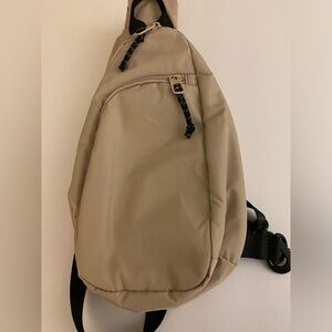 Puma slingback light beige bag.